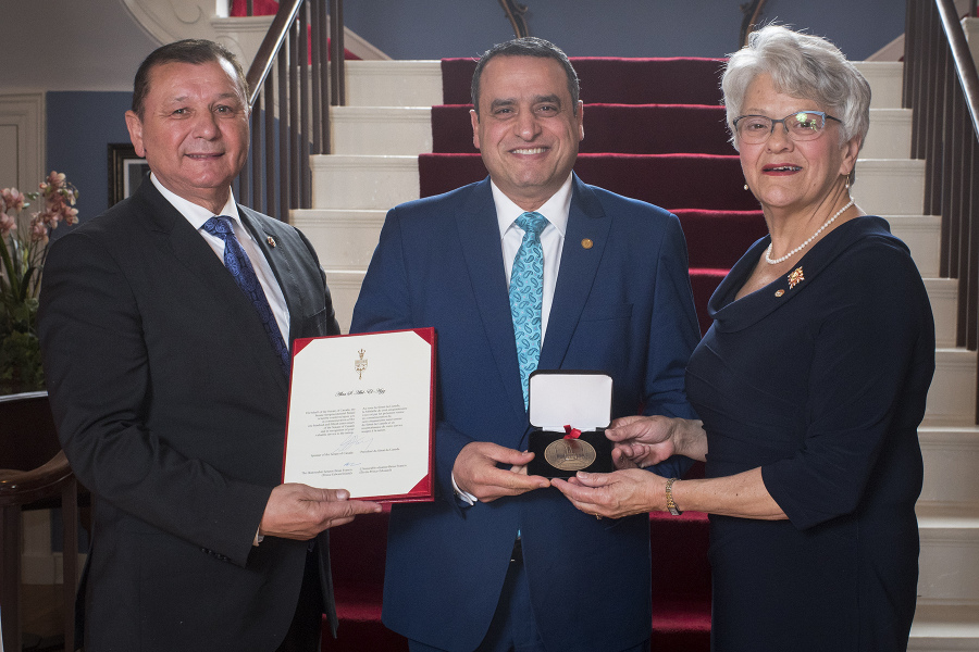 Hon. Brian Francis and Hon. Antoinette Perry presented UPEI President and Vice-Chancellor Alaa Abd-El-Aziz with the Senate 150 medal at Government House on April 26
