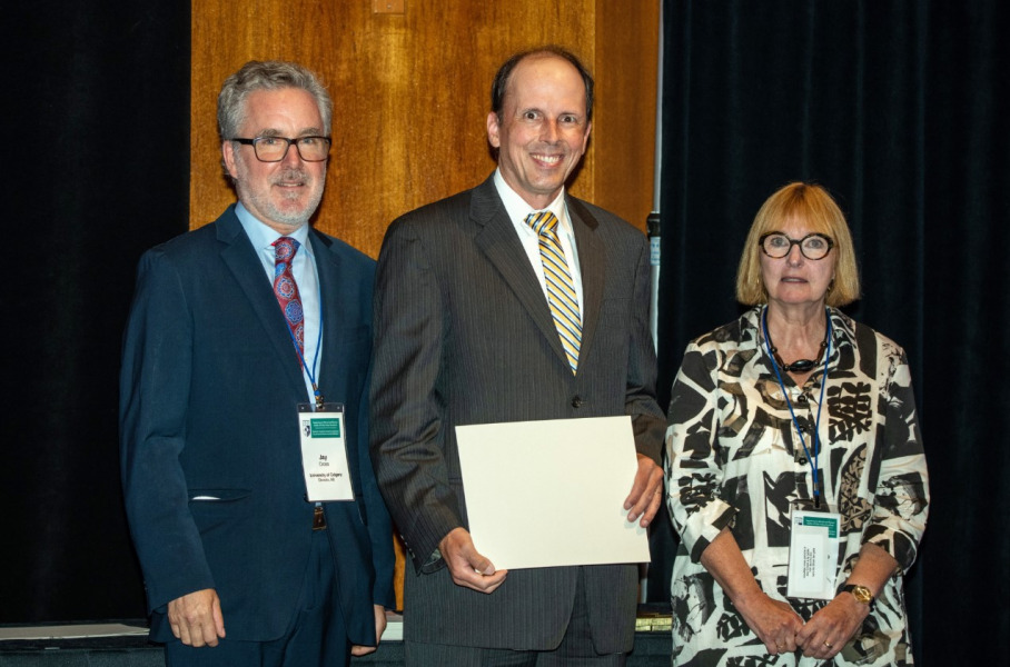 Dr. Étienne Côté (middle) during the Canadian Academy of Health Sciences induction ceremony. 