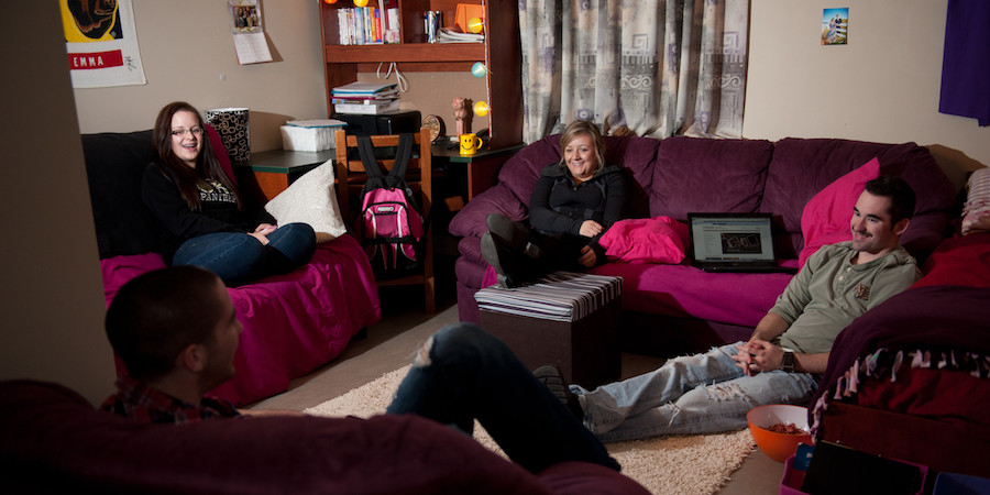 students relaxing in residence 