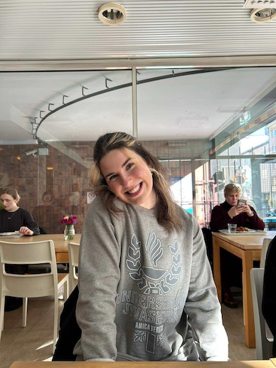 UPEI student Kathleen in Jyväskylä, Finland in a cafe
