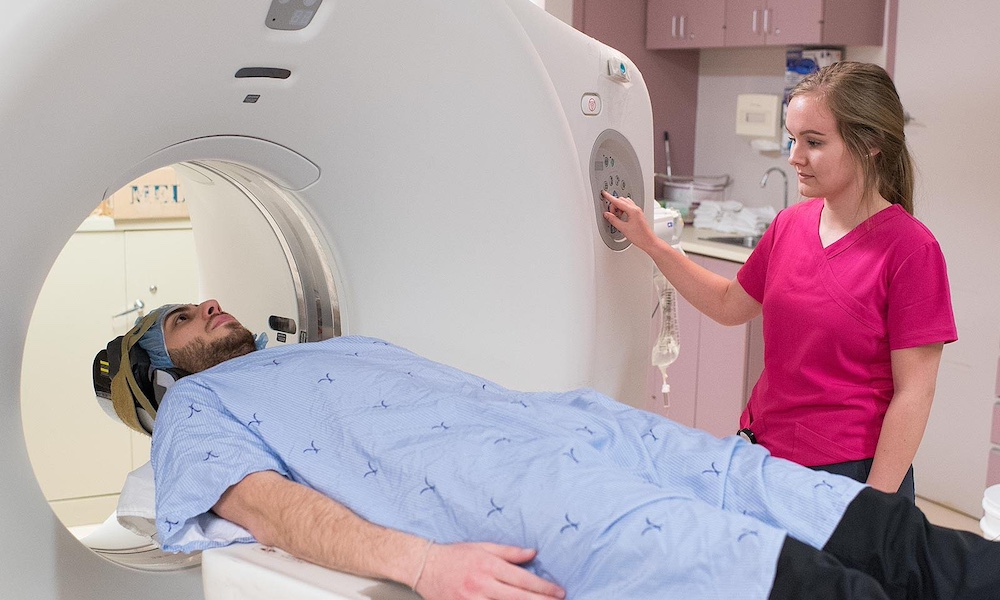 a patient in a CT scanning machine