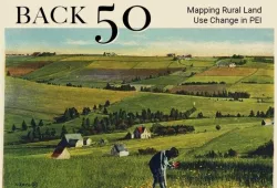 A aged photo of the rural PEI landscape with small "patchwork" farms dotting the horizon with the text "Back 50 project" imposed