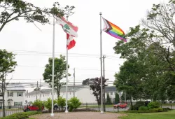 progress pride flag flying at UPEI