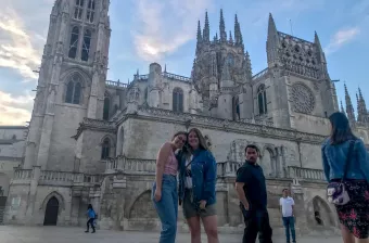 Abby Gibson in Burgos, Spain with a cathedral in the background