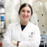 upei chemistry graduate maggie leclair working in a laboratory