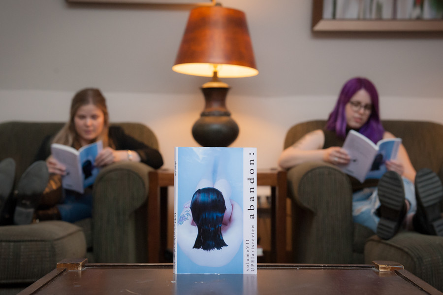 Students read the UPEI Arts Review