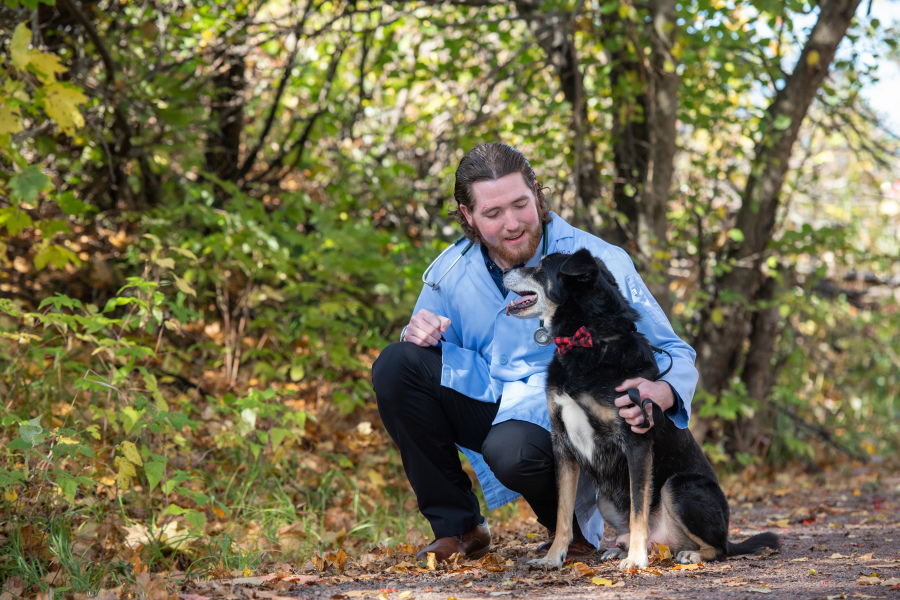 AVC student Nicholas Johnston and canine friend Kiba AVC student Nicholas Johnston and canine friend Kiba