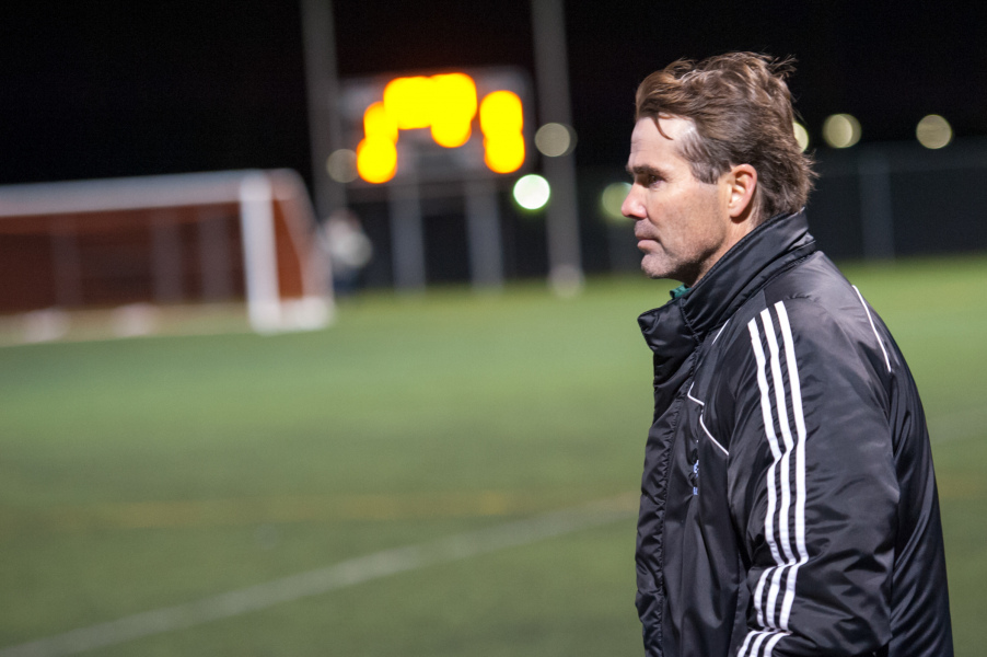Coach Lewis Page at the 2014-2015 CIS men's soccer championship A man watches soccer