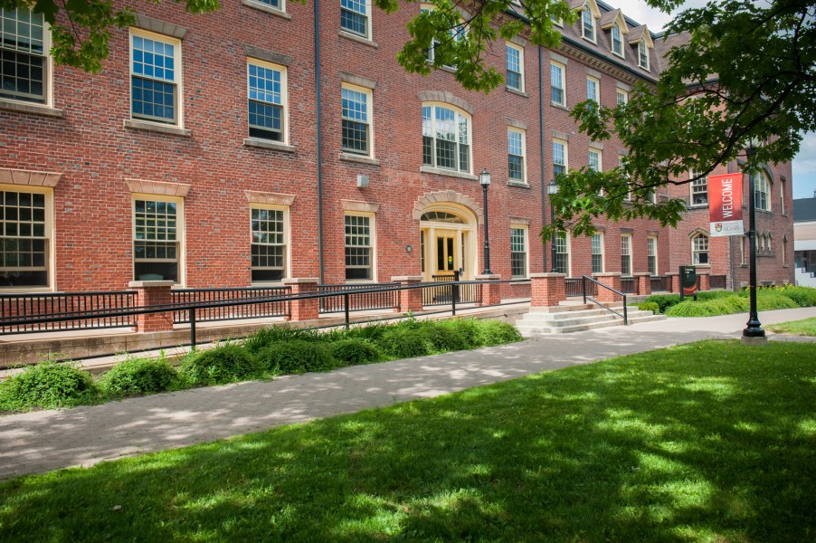 An image of a brick, three story building on UPEI Campus. It's SDU Main Building