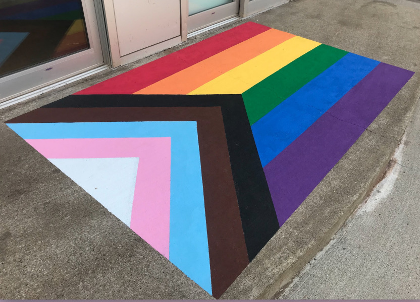 progress pride flag painted on steps