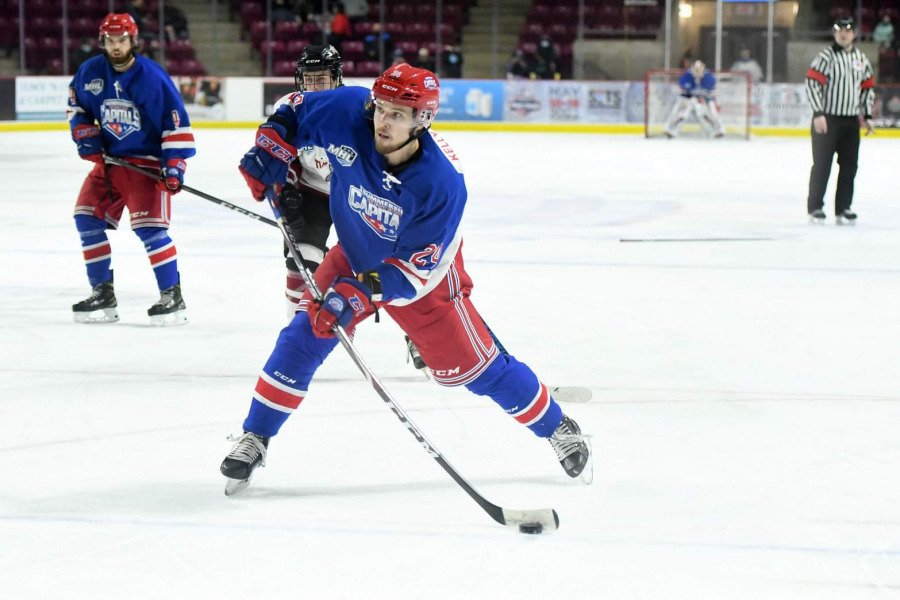 Photo cutline: China Point, PEI native Logan Kelly-Murphy will bolster the blue line for the UPEI Men's Hockey team this season photo of hockey player shooting the puck