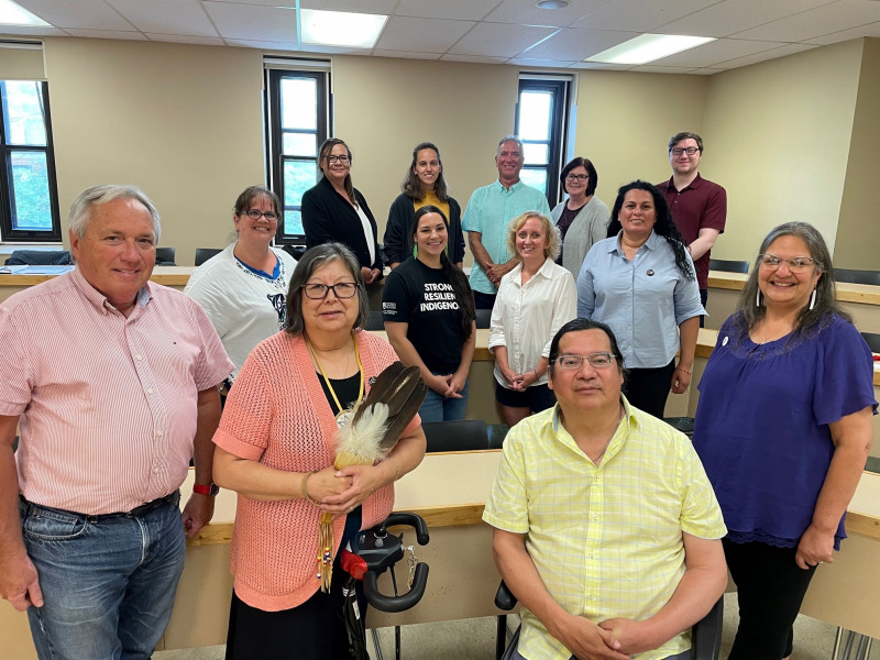 First row (left to right): Dr. Gary Evans, interim dean, Faculty of Indigenous Education, Research, and Applied Studies; Dr. Judy Clark, Elder-in-Residence; Dr. Patrick Augustine, assistant professor; Barbara Smith, lecturer; Second row (left to right): Lecturers Karla Green, Morgan Varis, and Erin Reid; assistant professor Margaret Augustine; Third row (left to right): Lecturers Tiffany Sark and Jasmine Pauze; assistant professor David Varis; lecturers Lori St. Onge and Brad Cooper; Missing from photo: Lecturers Dr. Alaina Roach O’Keefe, Corinne Chappell, and Doris Googoo Workshop for Faculty of IKERAS