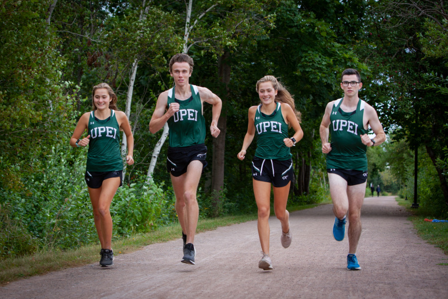 UPEI Cross Country Panthers (Grace Richard, Jack Roberts, Katie Richard and Riley Fitzpatrick) prepare to kick off the season