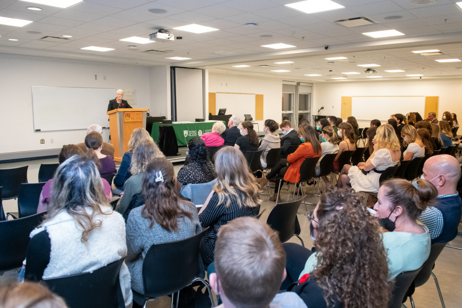 Dr. Anne Marie Carey, associate dean of academic and student affairs, welcomes guests to Fall Awards and Recognition Night. Dr. Anne Marie Carey, associate dean of academic and student affairs, welcomes guests to Fall Awards and Recognition Night.