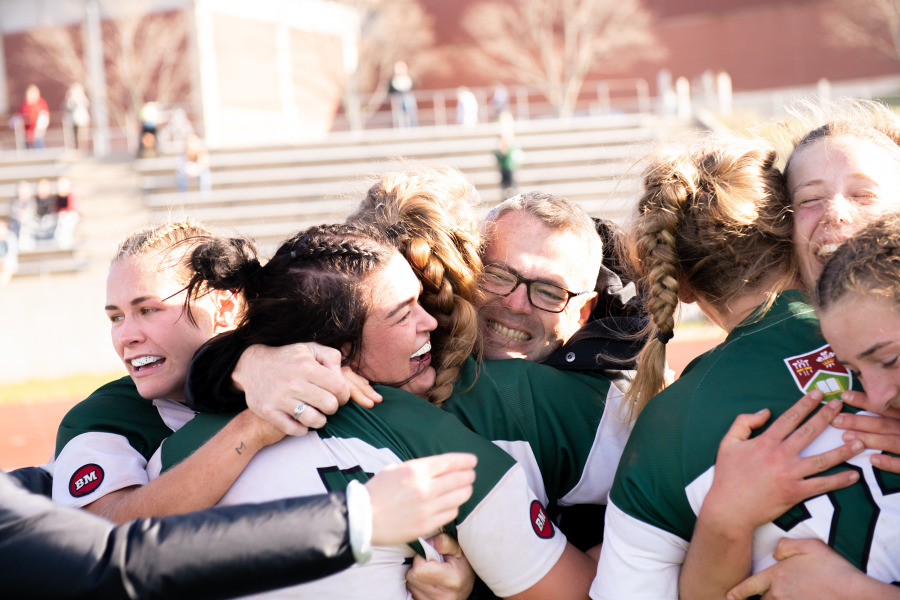 The UPEI Women's Rugby team celebrate winning their first AUS championship. UPEI Women's Rugby team