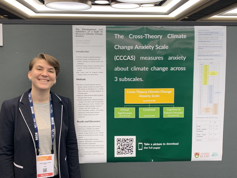 Allegra Netten, a fourth-year student in the UPEI doctor of psychology program, displays her award-winning poster presentation of her doctoral dissertation entitled The Development and Validation of a Scale to Measure Climate Change Anxiety. Allegra Netten