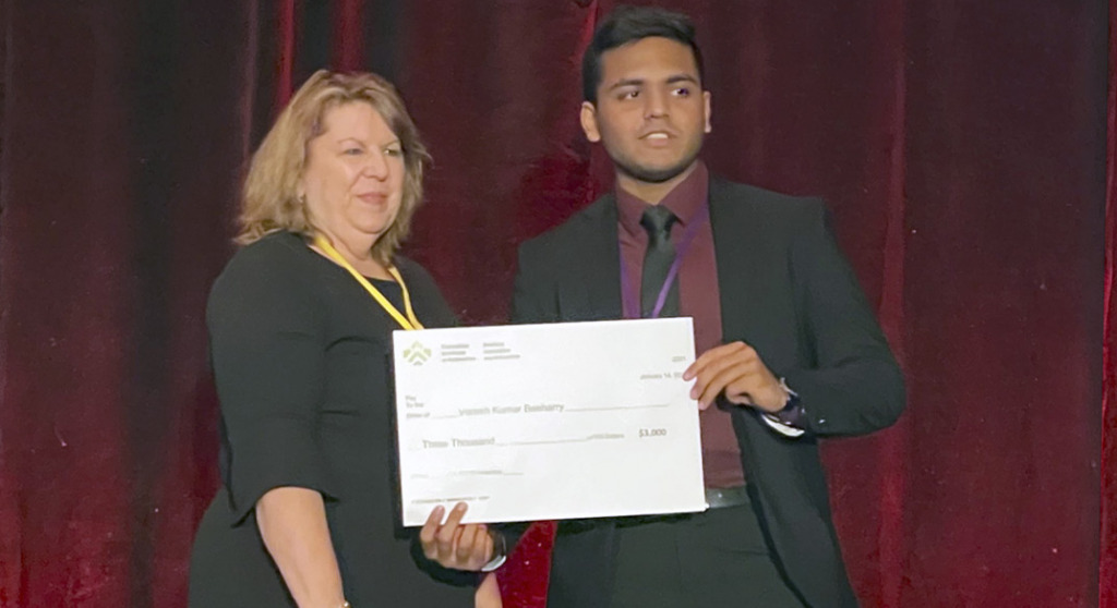 CIA President Hélène Pouliot presenting Varesh Kumar Beeharry with the Academic Achievement Award, one of three awards that comprise the inaugural ASNA-CIA Diversity, Equity and Inclusion Scholarships.