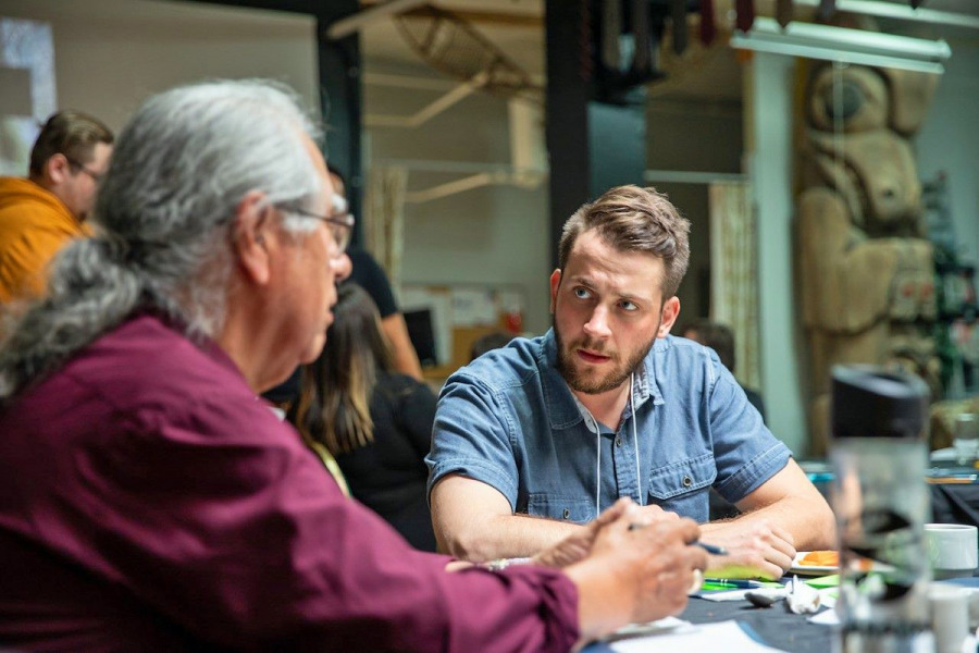 Dr. Nick Mercer (right) speaks with Elder Albert Marshall during the Co-Learning Health Research Summit that took place at the Mi’kmaw Native Friendship Centre in Halifax, Nova Scotia, in June 2019. Dr. Nick Mercer (right) and Elder Albert Marshall