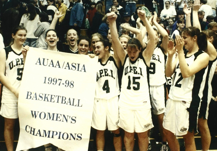 Eireann Rigby (#15) celebrates UPEI's 1997-98 AUAA championship with her teammates.