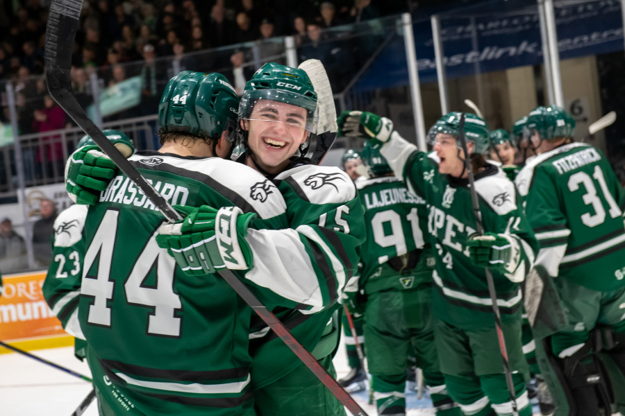 In front of a sell-out crowd at the Eastlink Centre, the UPEI Panthers celebrate after they upset the nation's top-ranked team, the University of Calgary Dinos, 4-2 to advance to the U CUP semifinals.