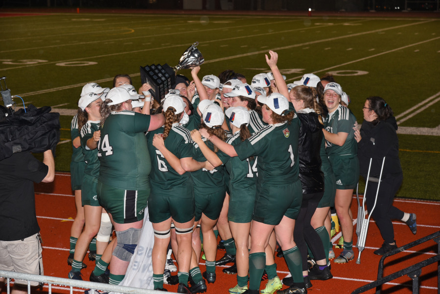 The UPEI Women’s Rugby Panthers celebrate after winning the AUS championship in 2022.