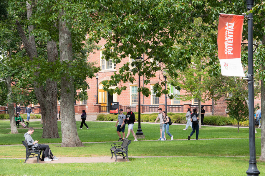 photo of quadrangle with welcome banner in the foreground