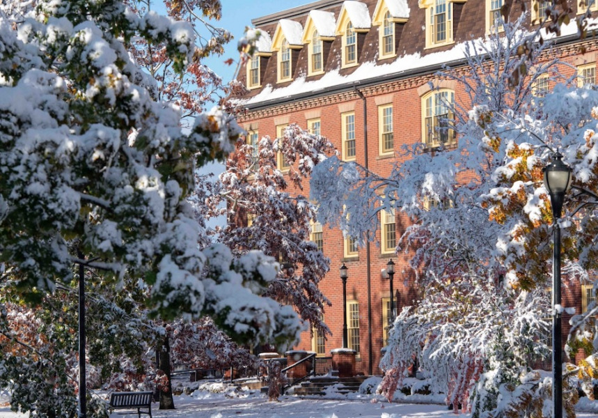 photo of brick building on campus during winter