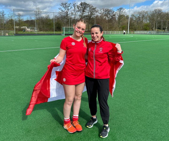 U17 female field hockey Team Canada player Ellie Mullins and assistant coach Lacey MacLauchlan.