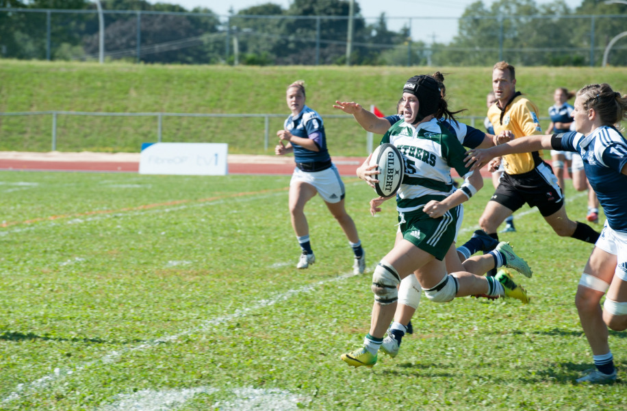 Alysha Corrigan carries the ball during a rugby match while she was a student-athlete at UPEI Alysha Corrigan carries the ball during a rugby match while she was a student-athlete at UPEI