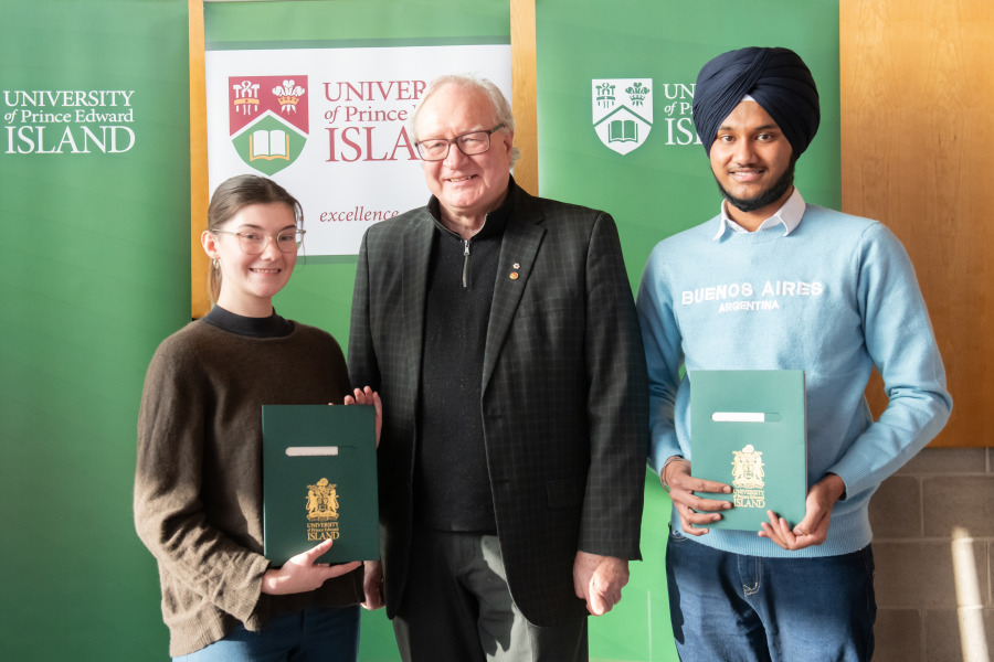 Award winners, Marie-Pier Thibault-Messier, Faculty of Nursing (left) and Rupinder Singh, Faculty of Science (right) with UPEI President Emeritus Wade MacLauchlan (centre). Award winners, Marie-Pier Thibault-Messier, Faculty of Nursing (left) and Rupinder Singh, Faculty of Science (right) with UPEI President Emeritus Wade MacLauchlan (centre).
