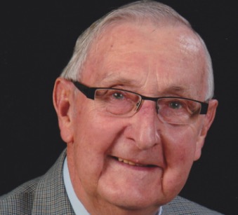 Dr. Lawson Drake was named a UPEI Founder in 2004. portrait photo of man wearing glasses