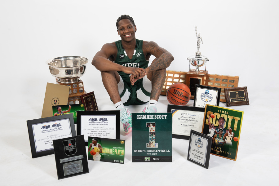 Kamari Scott poses with the awards he has earned throughout his six years at UPEI. Kamari Scott poses with the awards he has earned throughout his six years at UPEI.