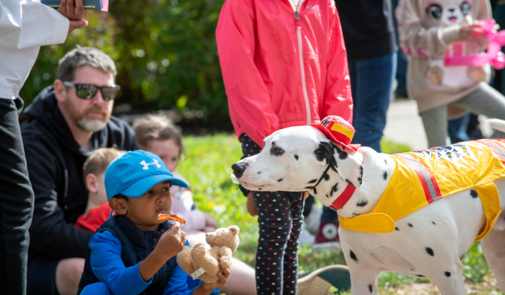 A participant in the Dog Parade at the 2024 Open House