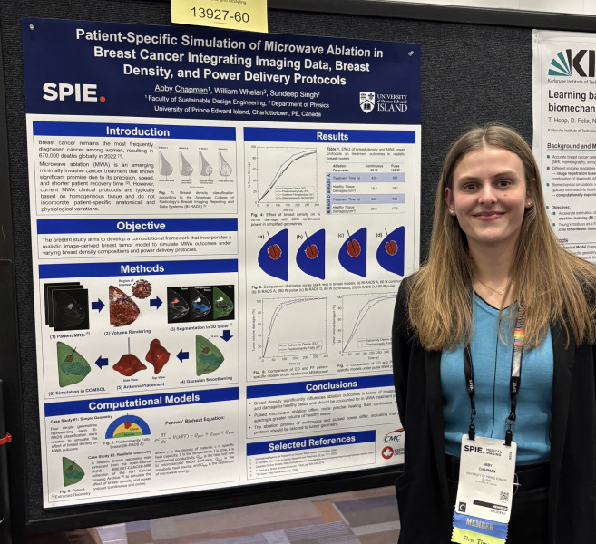 Abby Chapman stands next to the research poster she presented at the 2026 Society of Photo-Optical Instrumentation Engineers (SPIE) Medical Imaging Conference, held in Vancouver, BC, from February 14-19, 2026. 