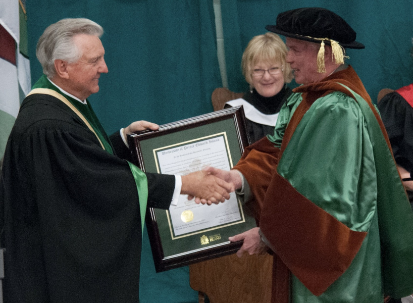Major-General (Retired) Matthew Macdonald (right) received his honorary degree in 2014 from then Chancellor Dr. Don McDougall. 