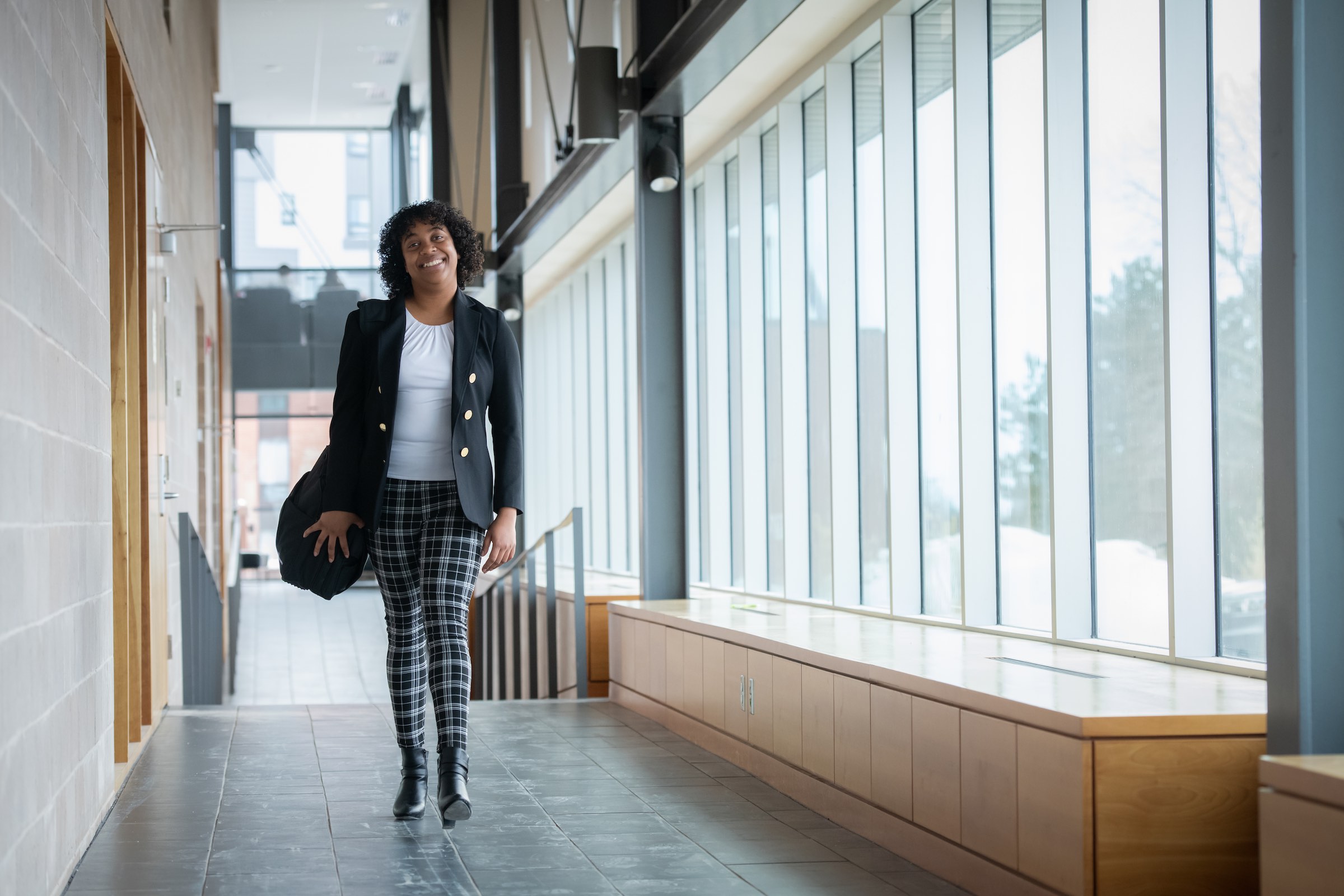 UPEI MBA in global leadership student Nathalie in the Faculty of Business building