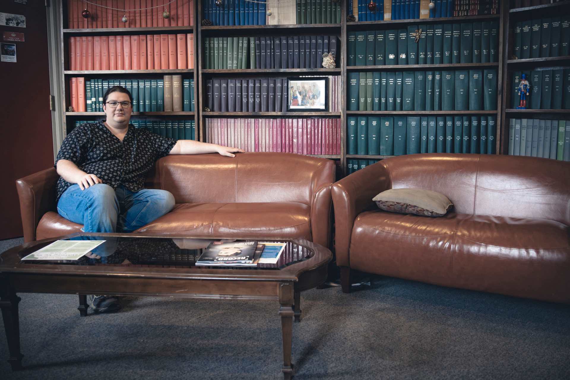 UPEI History student Riley Drake in the History student lounge