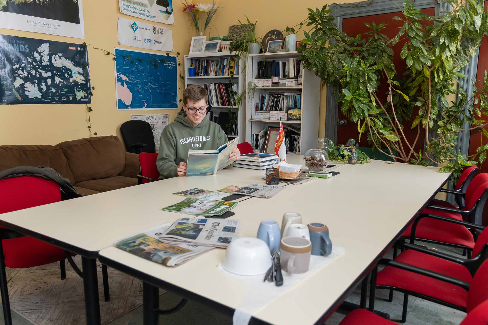 UPEI Master of Arts in Island Studies student Jack Weeks reading a book