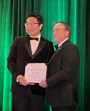 ​  Dr Xiuquan (Xander) Wang, associate professor and director of the Climate Smart Lab at UPEI’s Canadian Centre for Climate Change and Adaptation, receives the E. Whitman Wright Award for Excellence in Information Technology in Civil Engineering from Wade Zwicker, president of the Canadian Society for Civil Engineering.