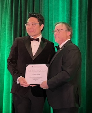  Dr Xiuquan (Xander) Wang, associate professor and director of the Climate Smart Lab at UPEI’s Canadian Centre for Climate Change and Adaptation, receives the E. Whitman Wright Award for Excellence in Information Technology in Civil Engineering from Wade Zwicker, president of the Canadian Society for Civil Engineering.
