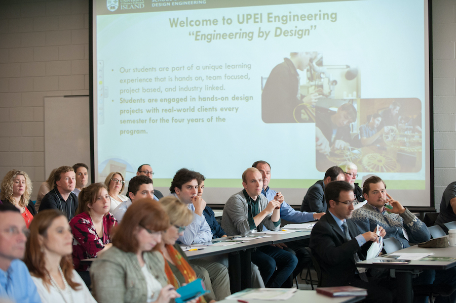 People listening at an event for industry