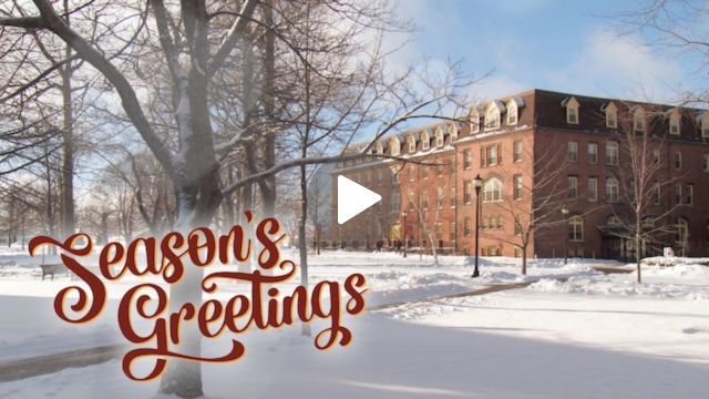 winter photo with Season's Greetings and play button