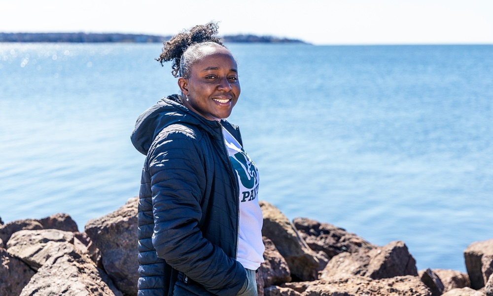 UPEI Master of Arts in Island Studies student Ayana Arnaud on the Charlottetown waterfront