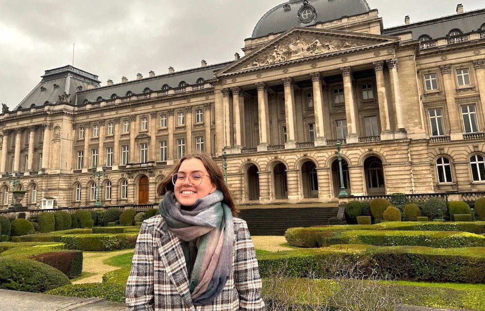 Abby Gibson in front of the royal palace in Brussels, Belgium