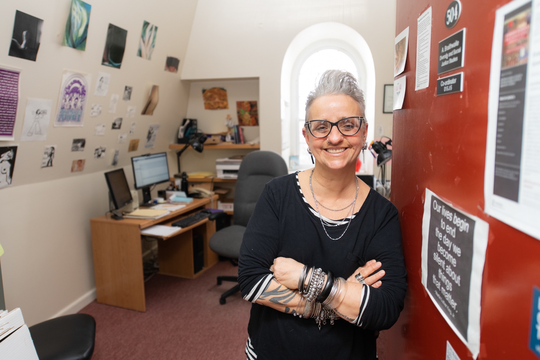 upei professor ann braithwaite standing in doorway with her office in the background
