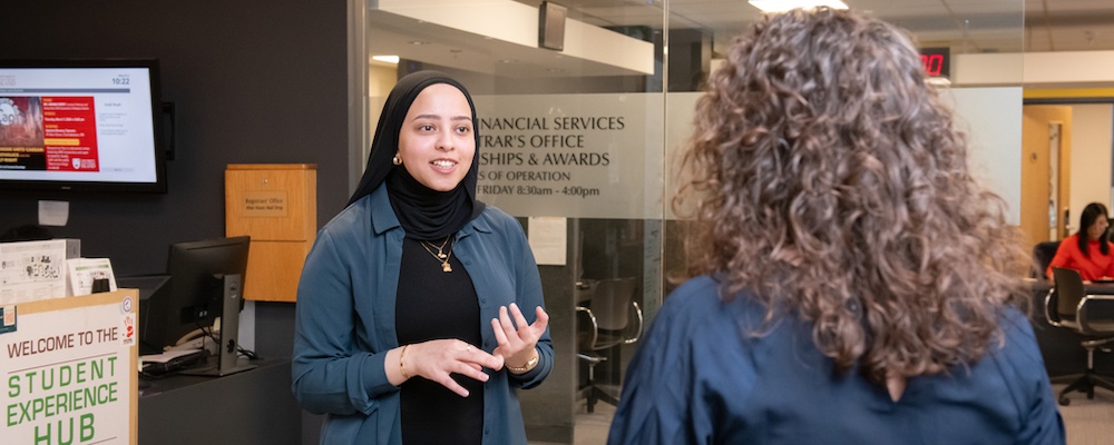 two people talking in an office