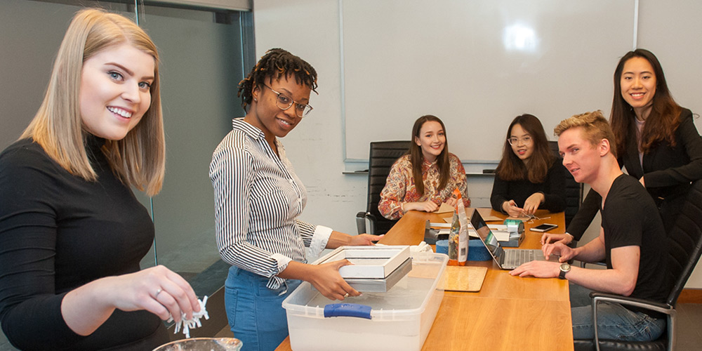 Entrepreneurship students work in a study room