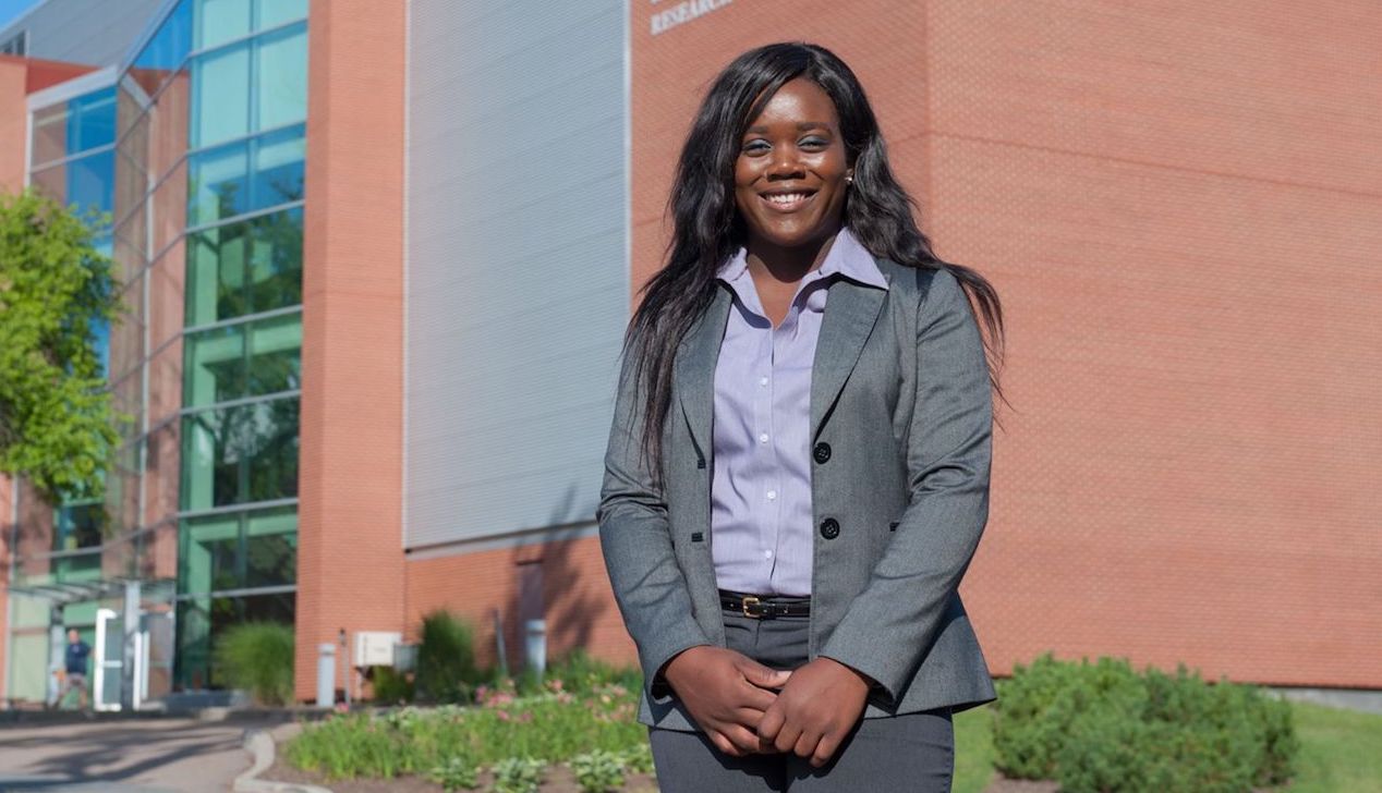 co-op student in front of duffy research centre