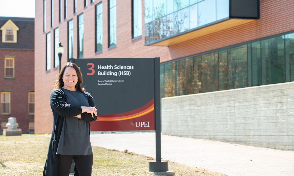 UPEI grad student and instructor Bethany Vessey by the Health Sciences Building