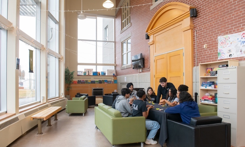 students playing a game in the Campus Life Lounge